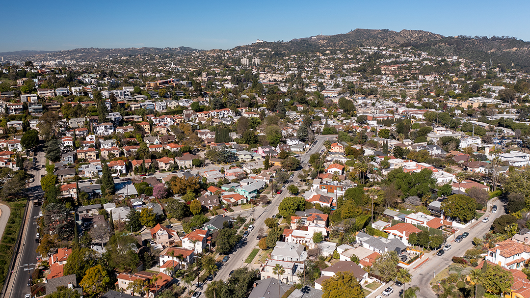 Aerial image of Silver Lake home with Griffith Observatory and Hollywood Sign in the background. Photo by Erik Grammer